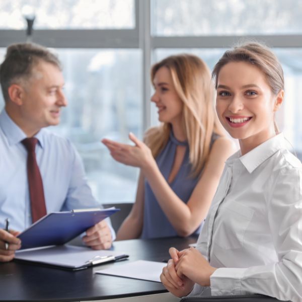 Woman smiling in meeting